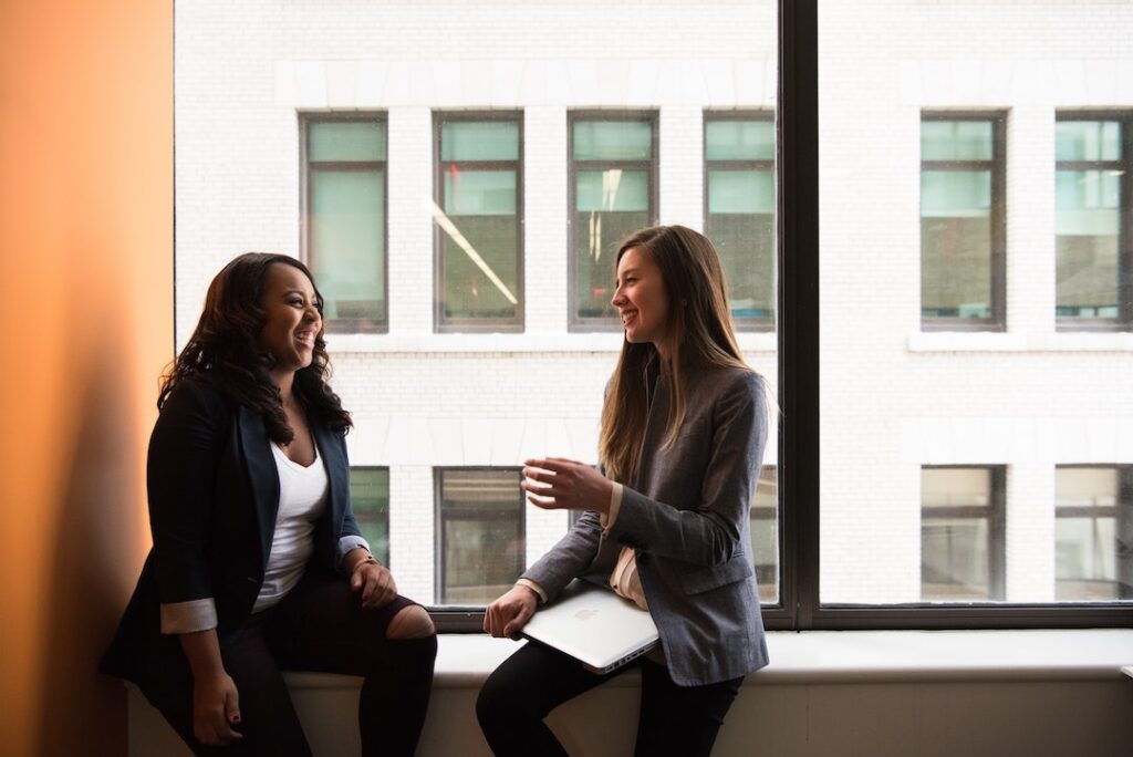 Colleagues talking at work