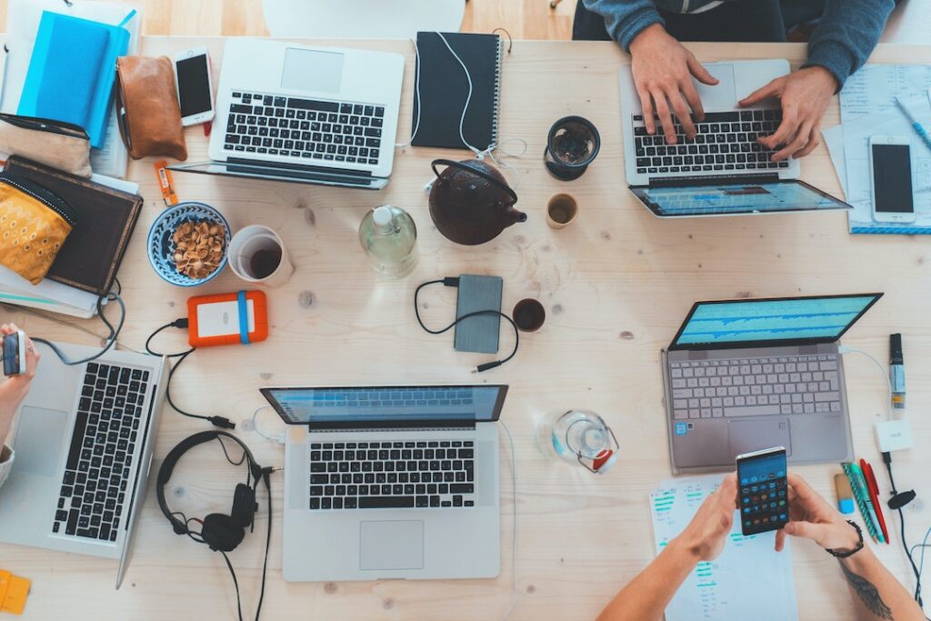 Laptops and work material on a table